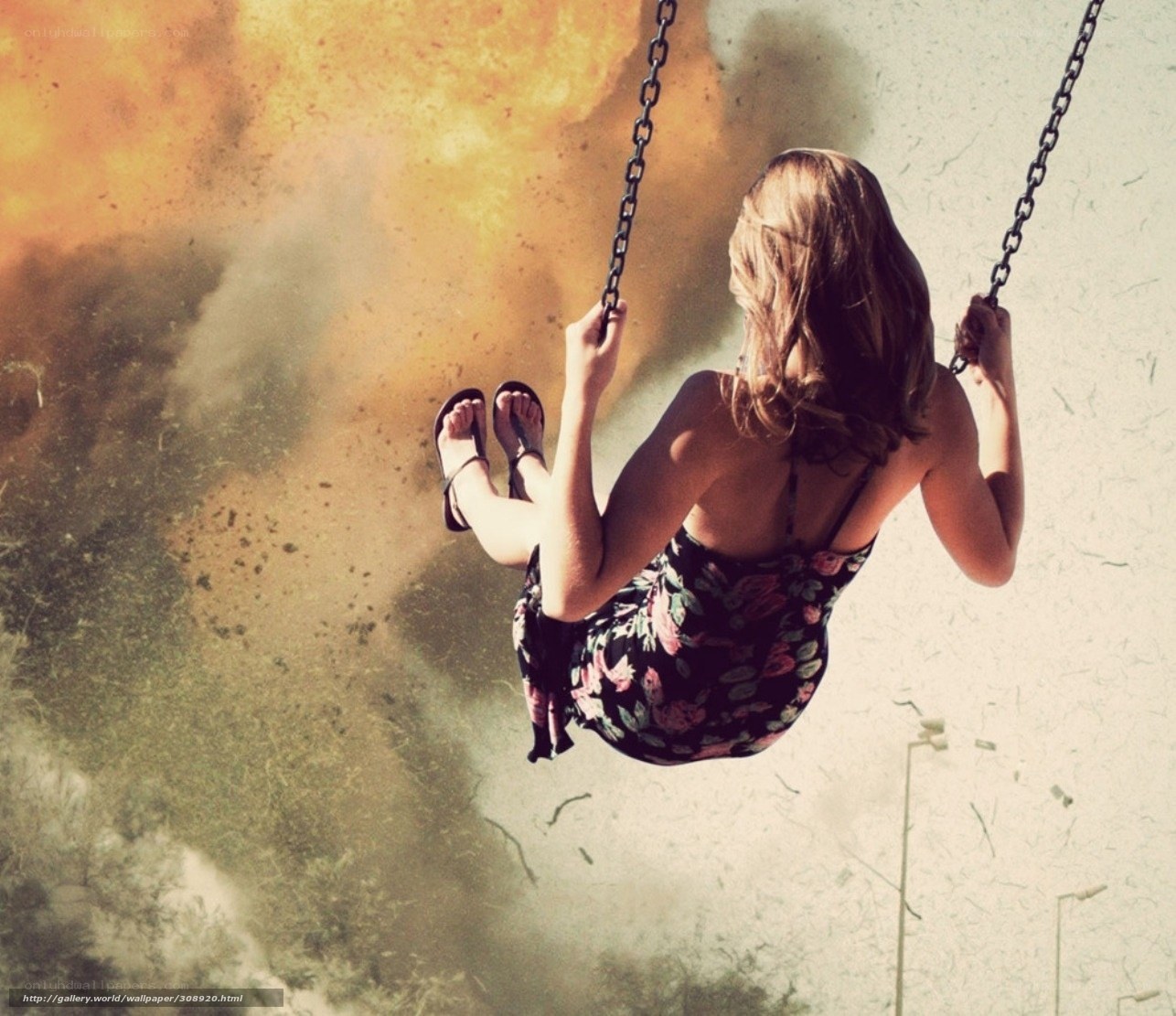 Woman on swing with explosion