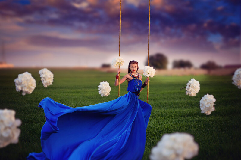 Woman on Swing with Flowers — Blue