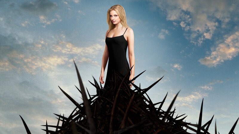Woman on thorny mound