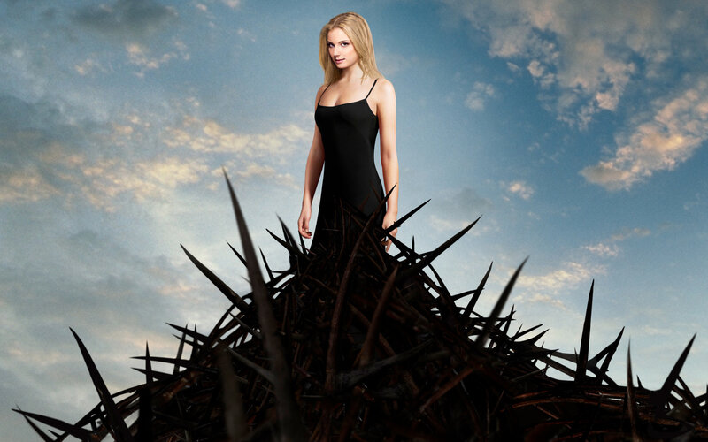 woman on thorny mound