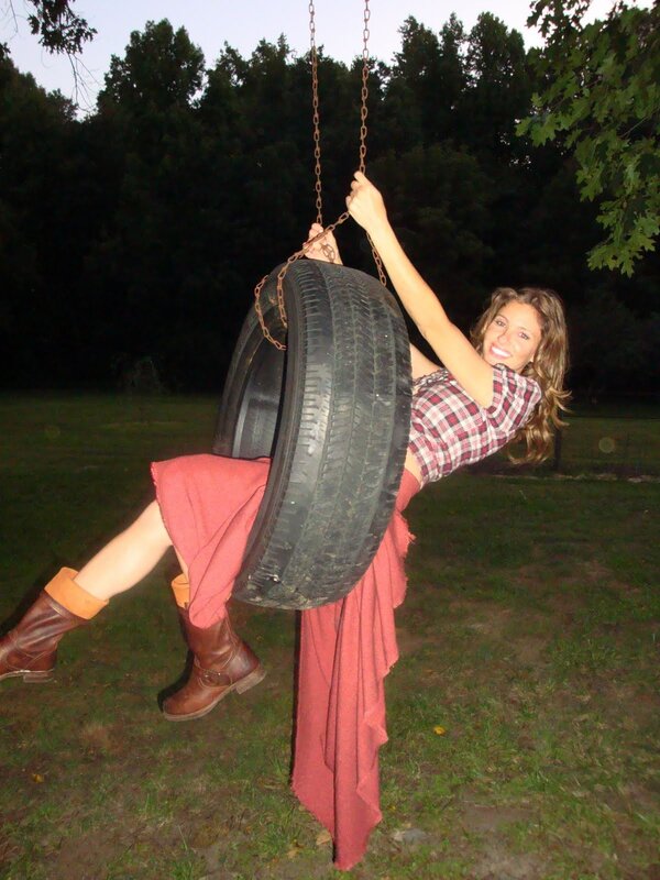 woman on tire swing