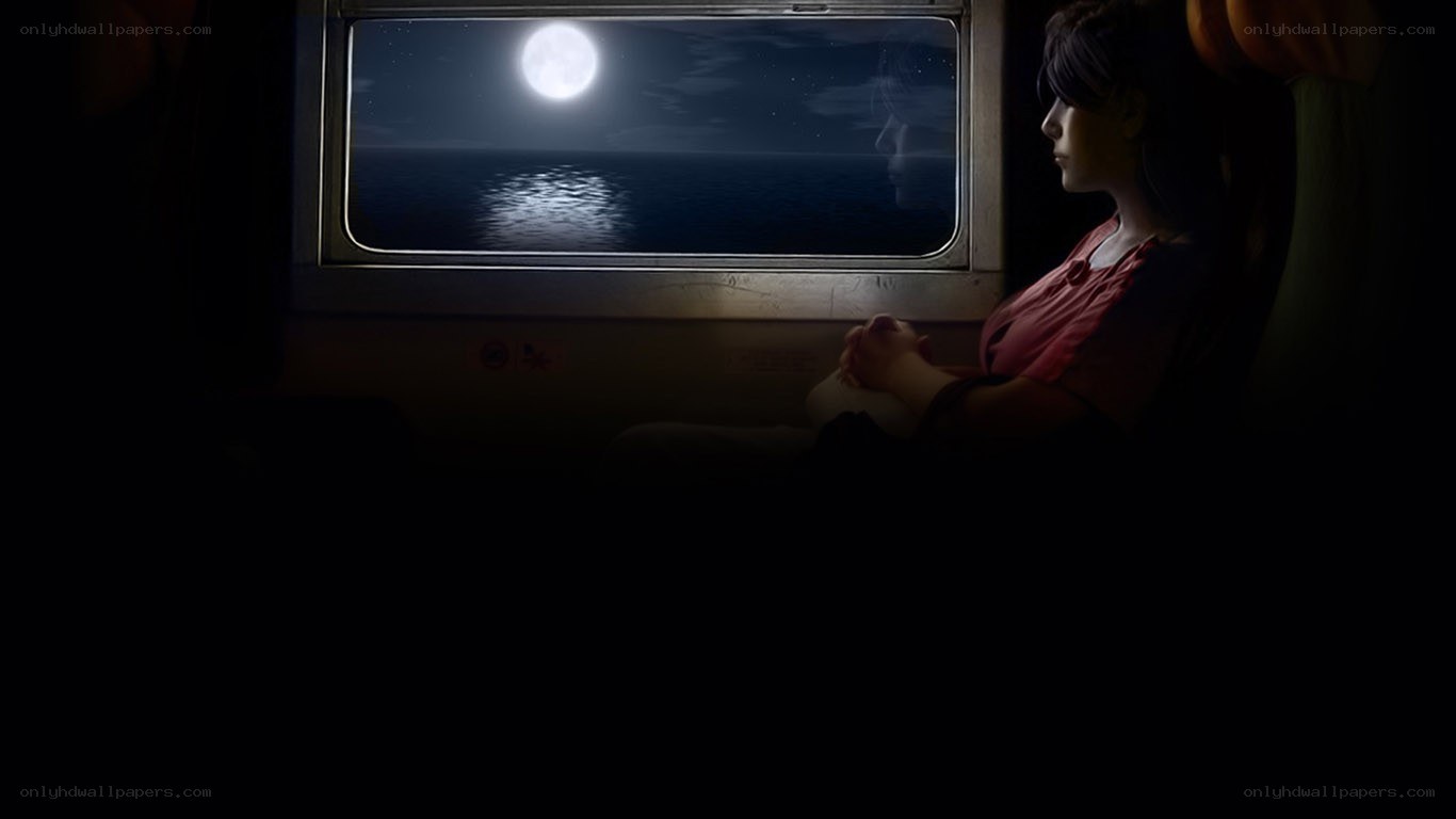 woman on train at night
