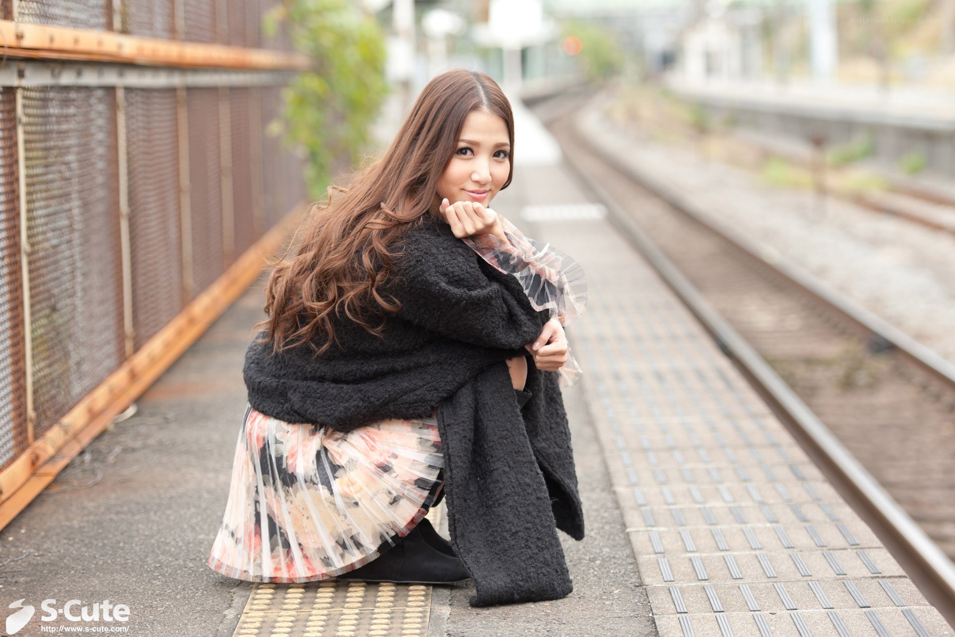 woman on train platform