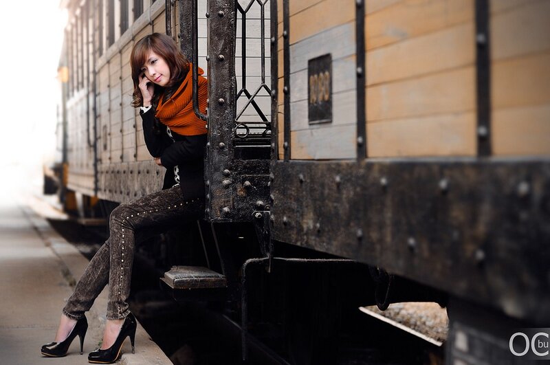 Woman on train step
