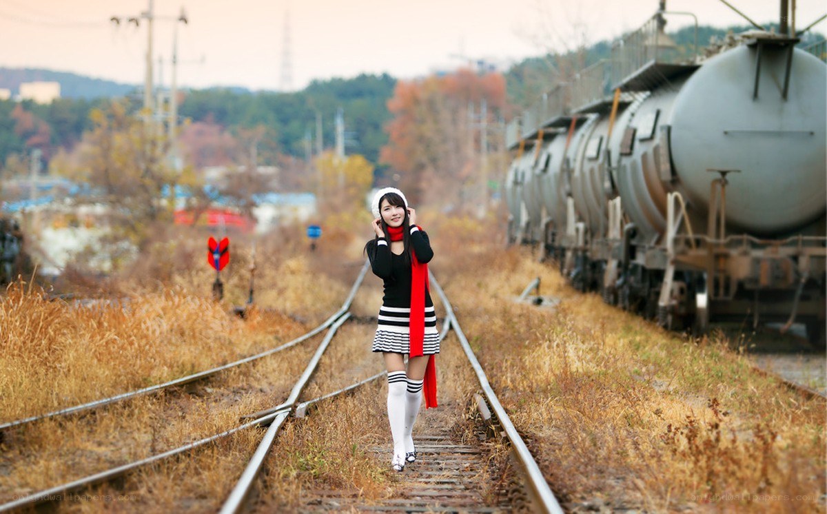 Woman on train tracks