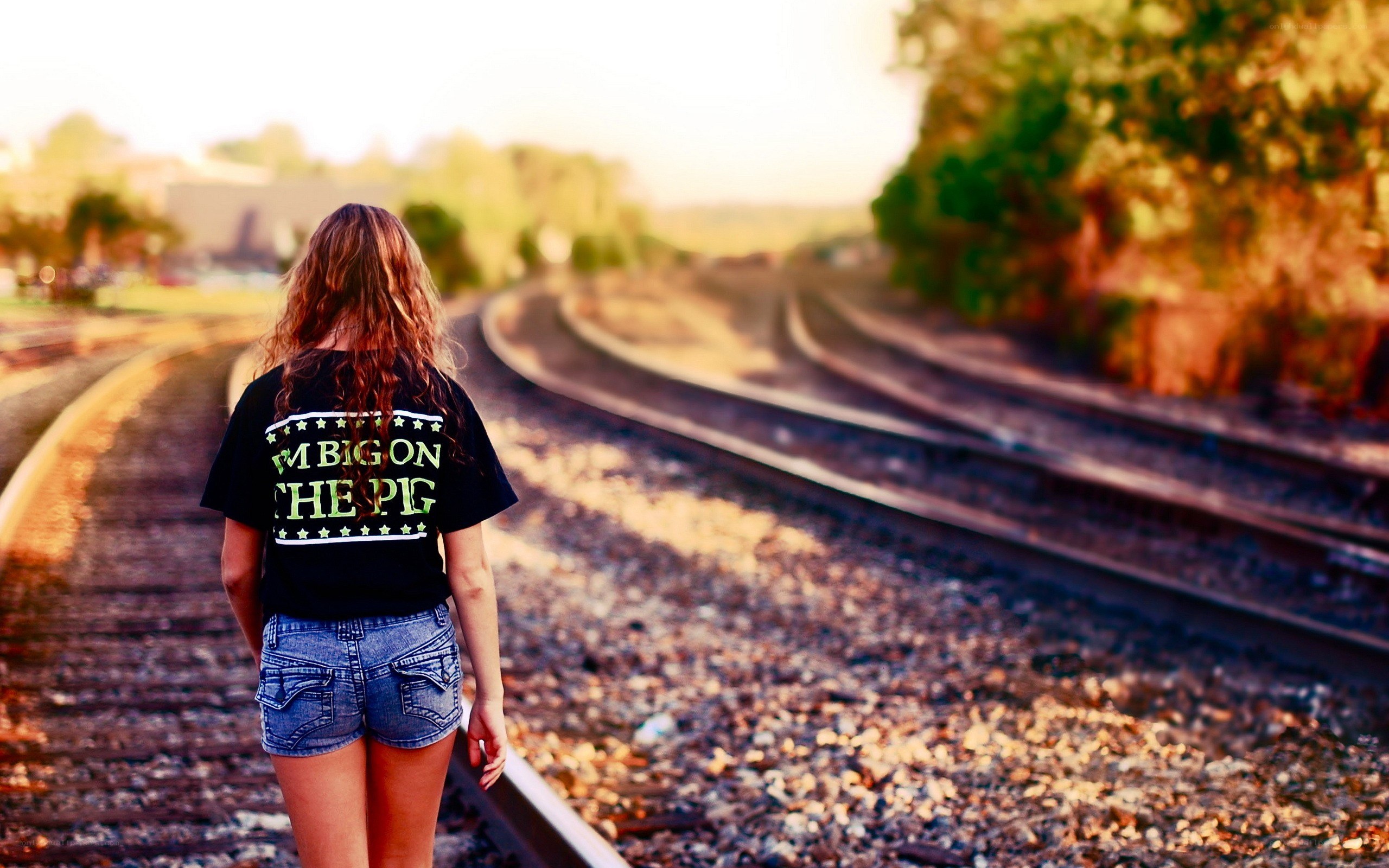 woman on train tracks