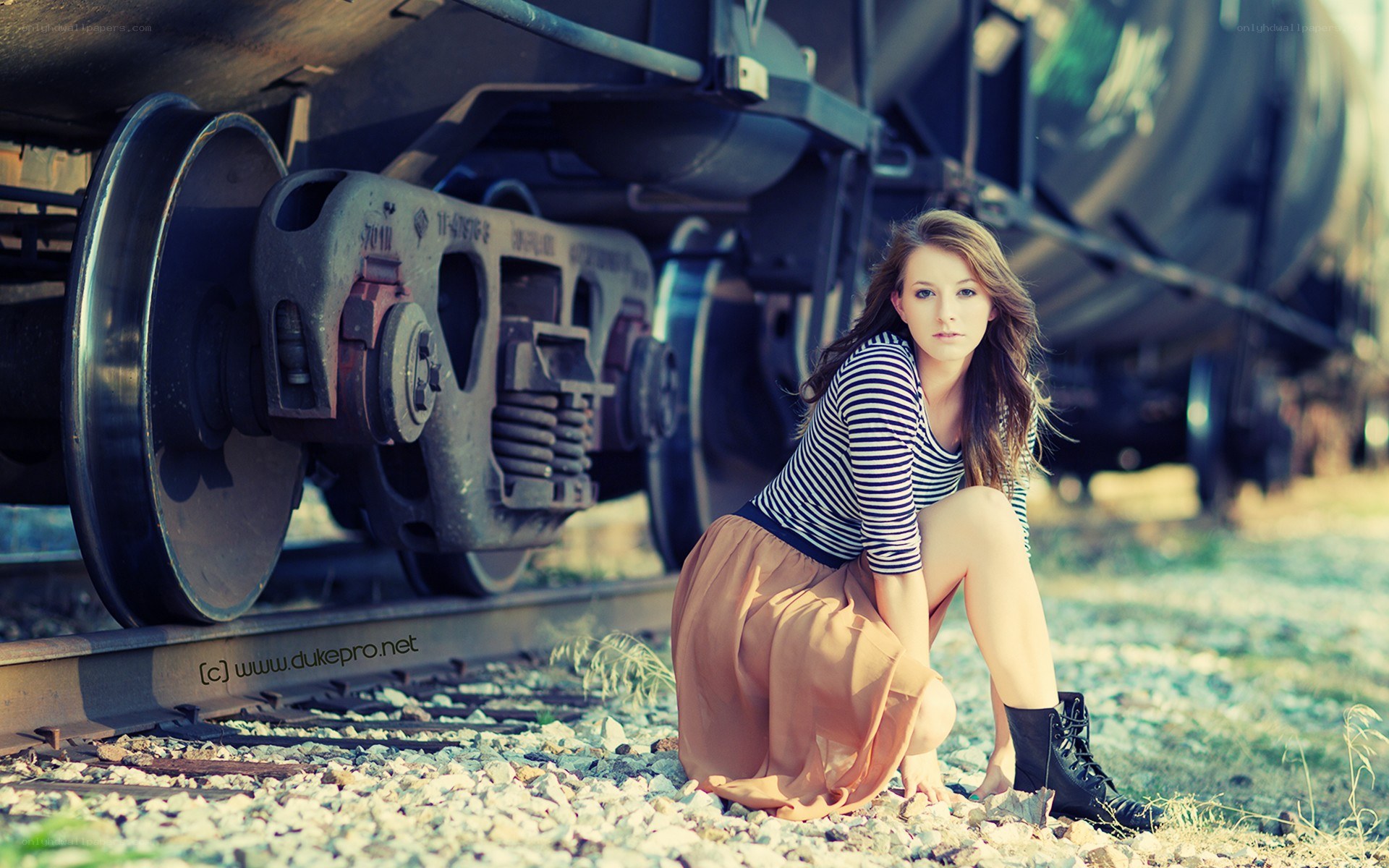 Woman on train tracks