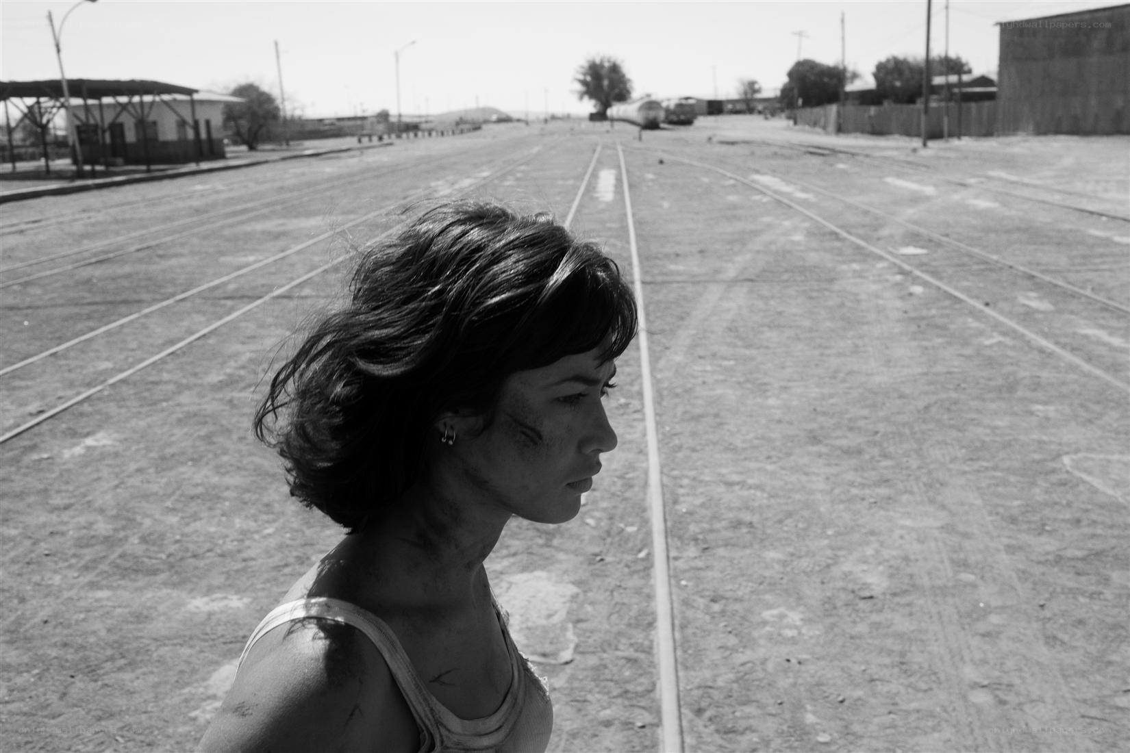 woman on train tracks