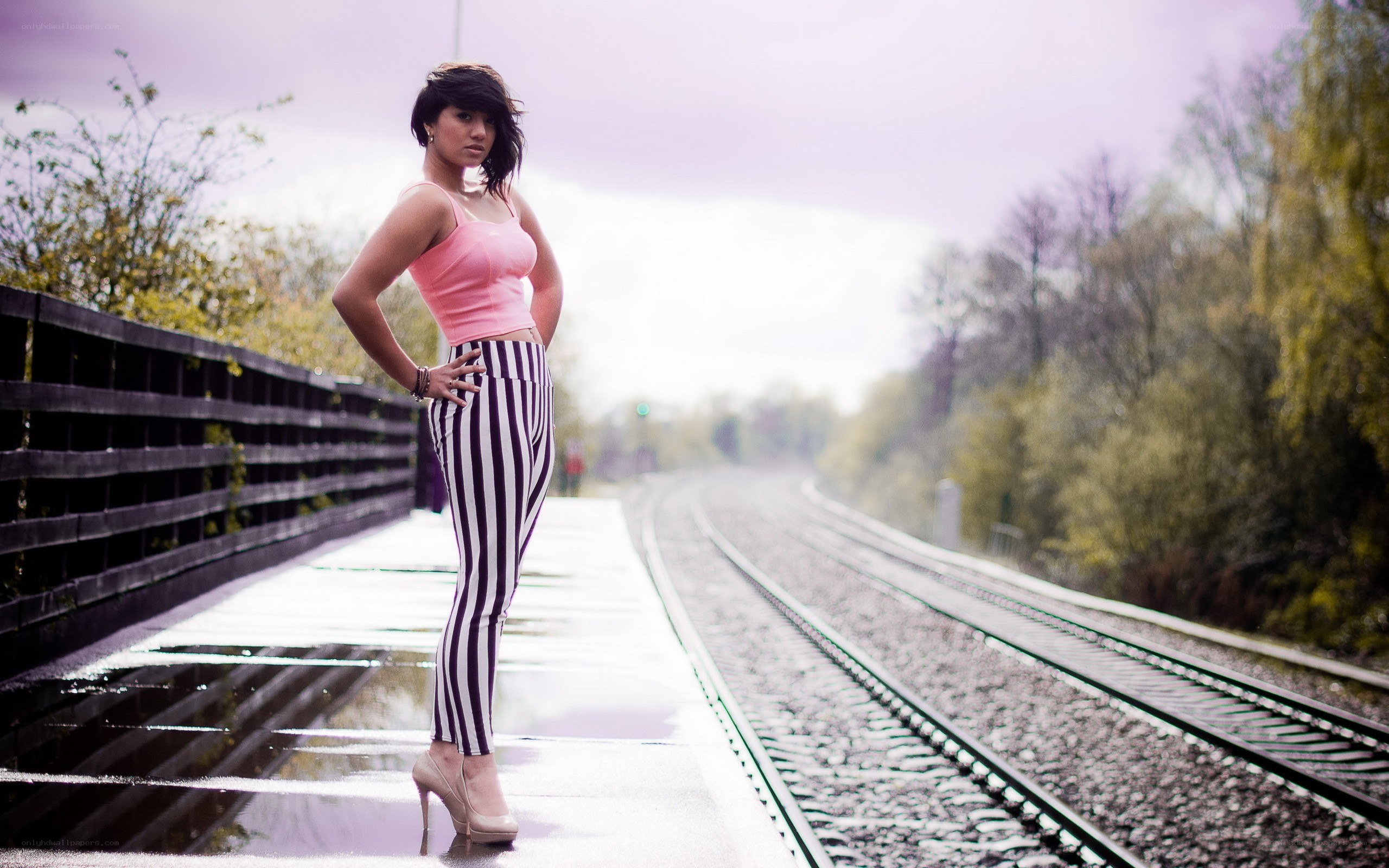 woman on train tracks