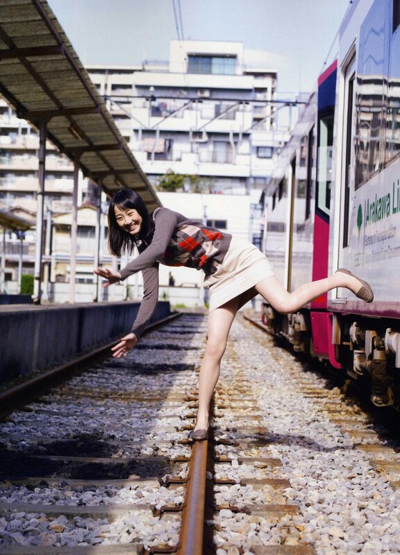 Woman on Train Tracks — Beige