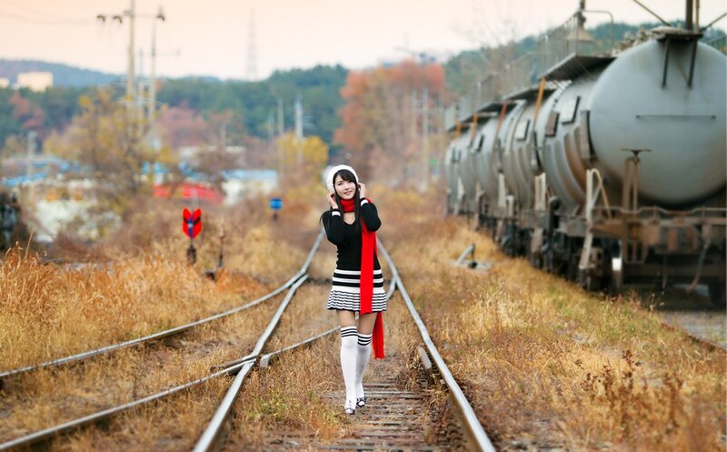 Woman on Train Tracks — Brown, Calm