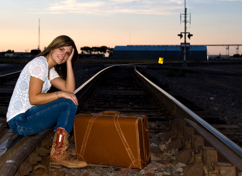 Woman on Train Tracks — Brown, Contemplative, Sunset