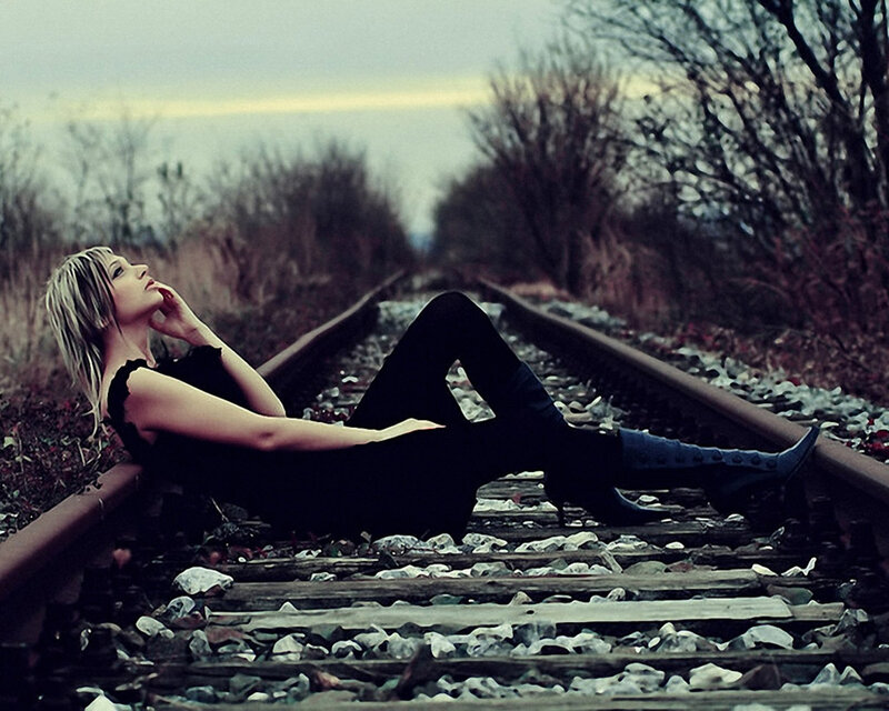 Woman on Train Tracks — Gray