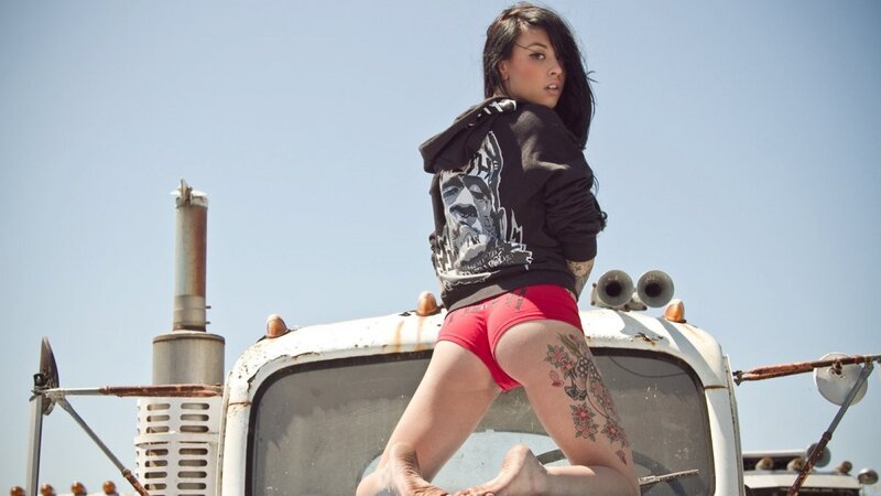 woman on truck in desert