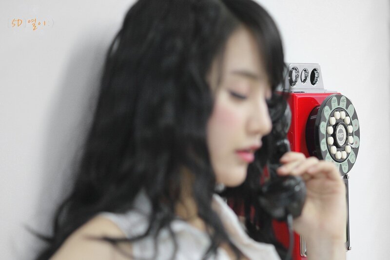woman on vintage phone