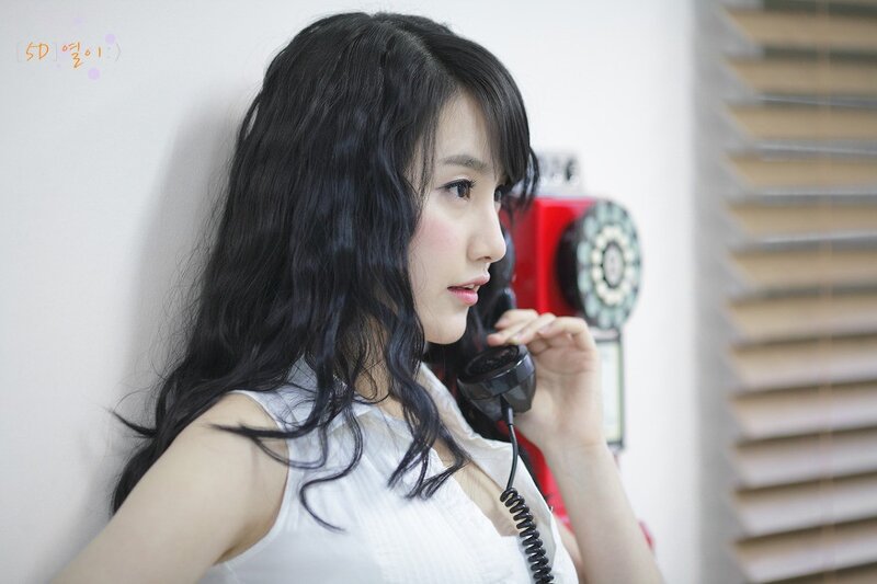 woman on vintage phone