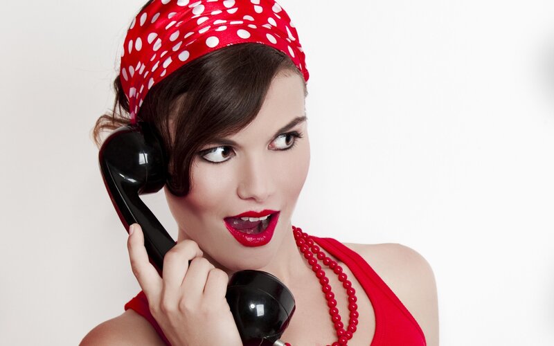 woman on vintage phone