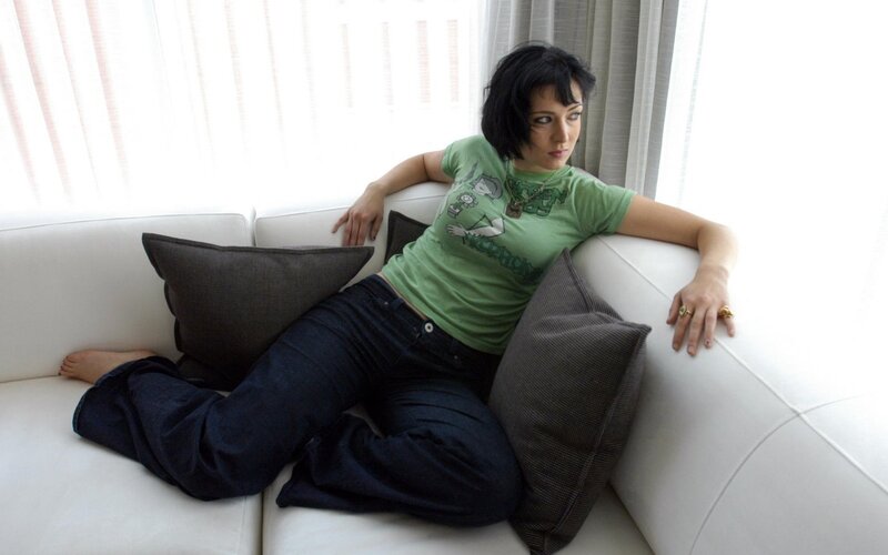 Woman on White Couch — Relaxed, Afternoon, Photograph, Pillows, Window