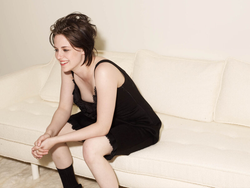 Woman on White Couch — Relaxed, Photograph, Black Dress