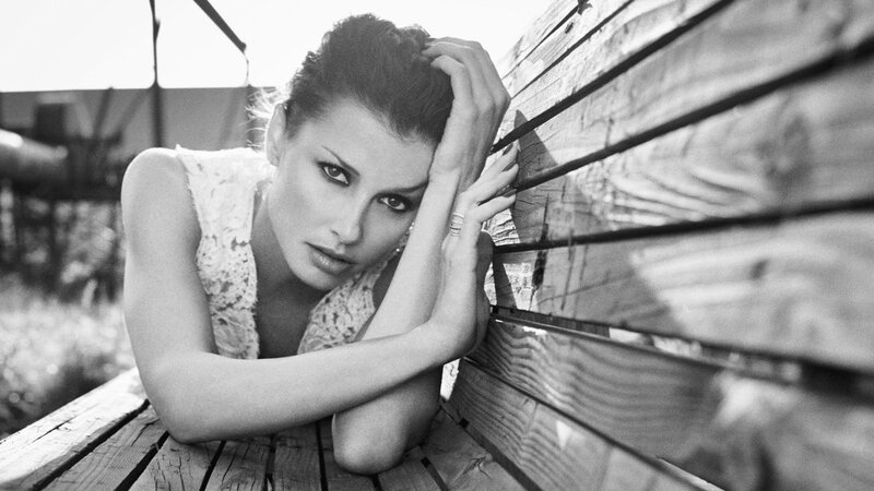 woman on wooden bench