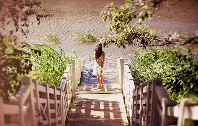 Woman on Wooden Bridge — Brown