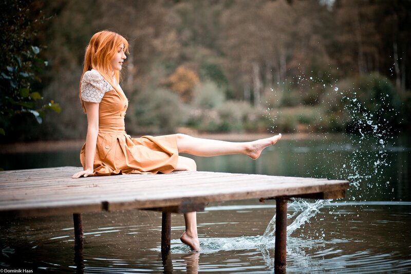 Woman on Wooden Dock — Orange