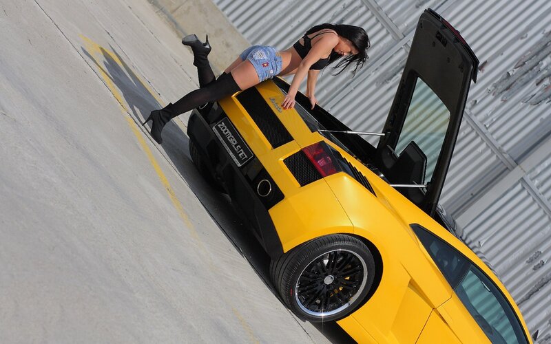 Woman on Yellow Car — Dramatic, Afternoon
