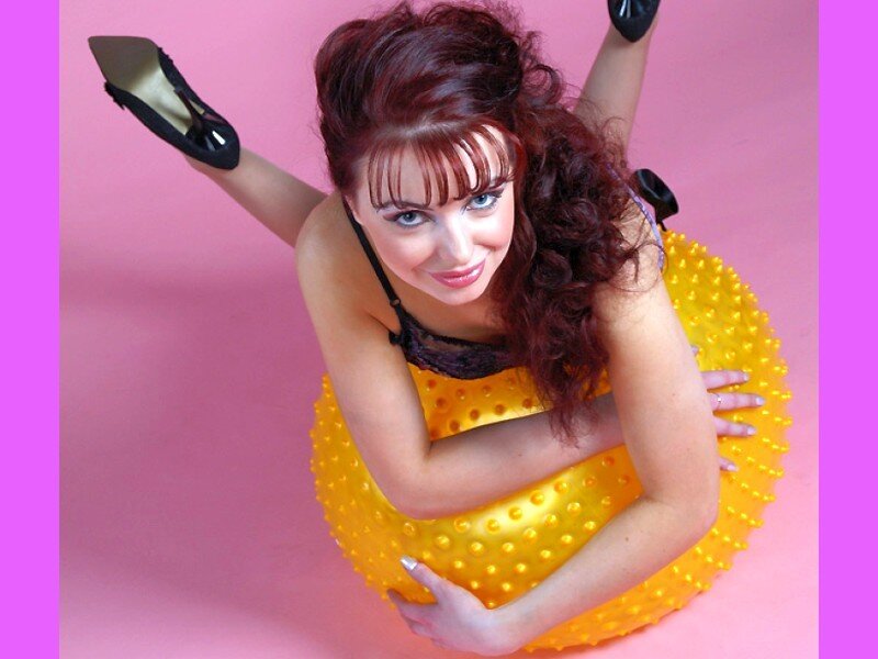 woman on yellow exercise ball