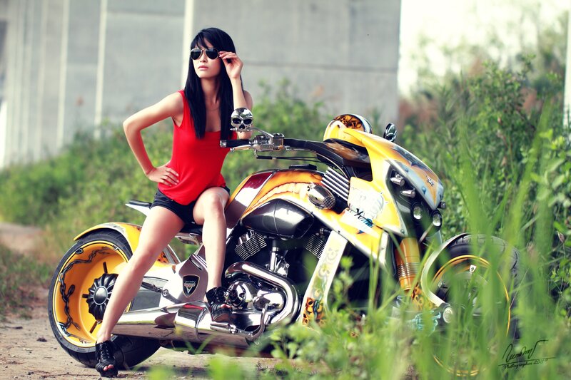 Woman on Yellow Motorcycle — Confident, Afternoon, Photograph