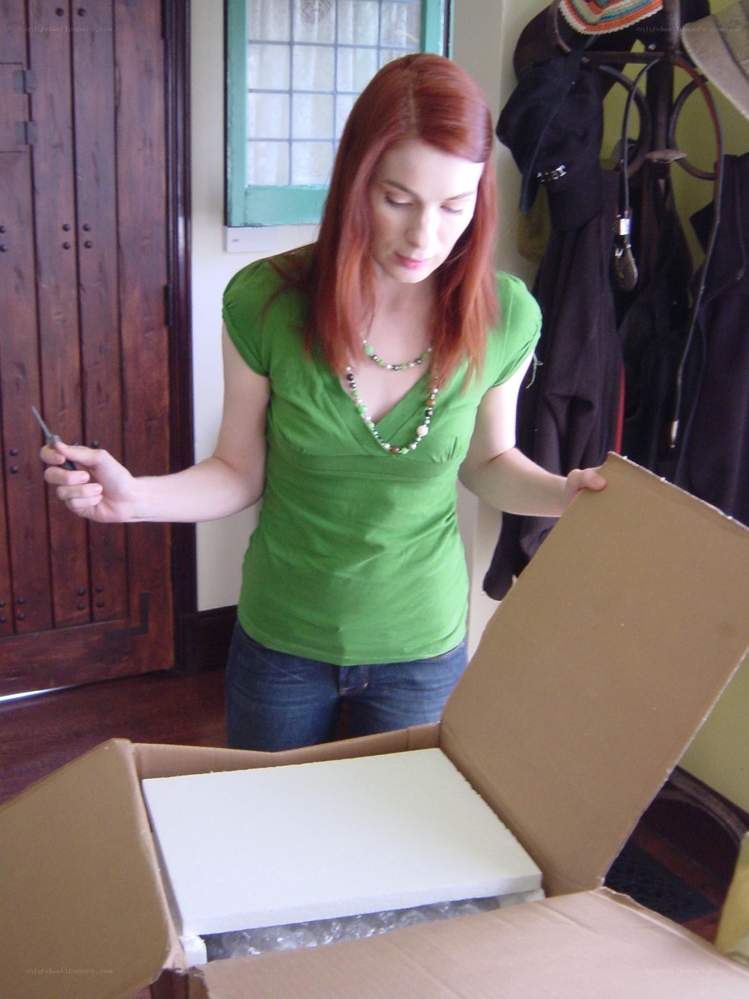 woman opening a package