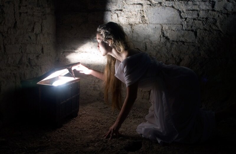 Woman Opening Chest