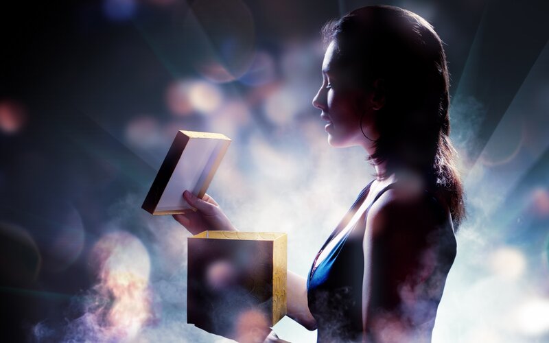 woman opening gift box