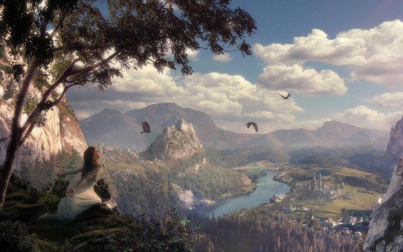 Woman overlooking a fantasy valley