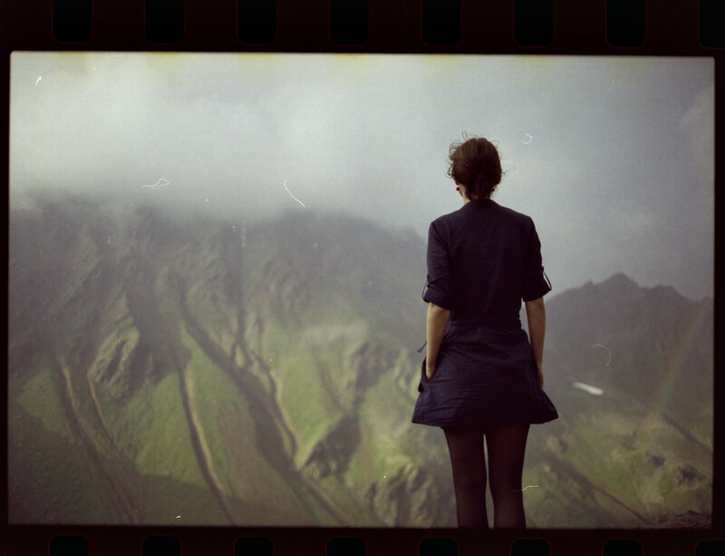 Woman overlooking a mountain valley