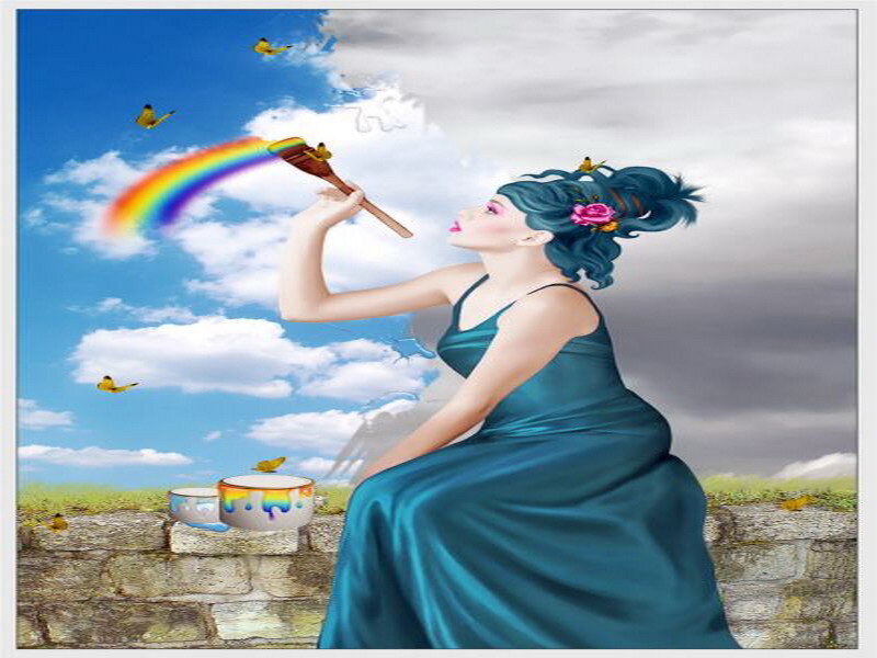 woman painting a rainbow