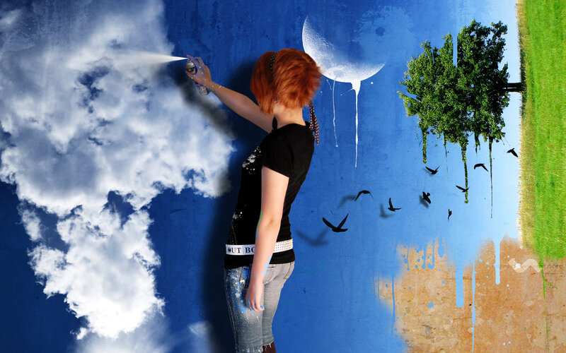 woman painting a surreal landscape