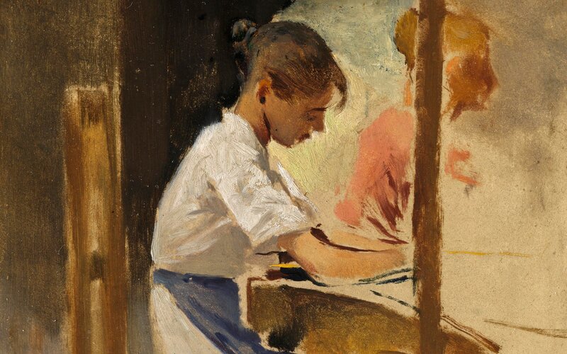 woman painting at easel