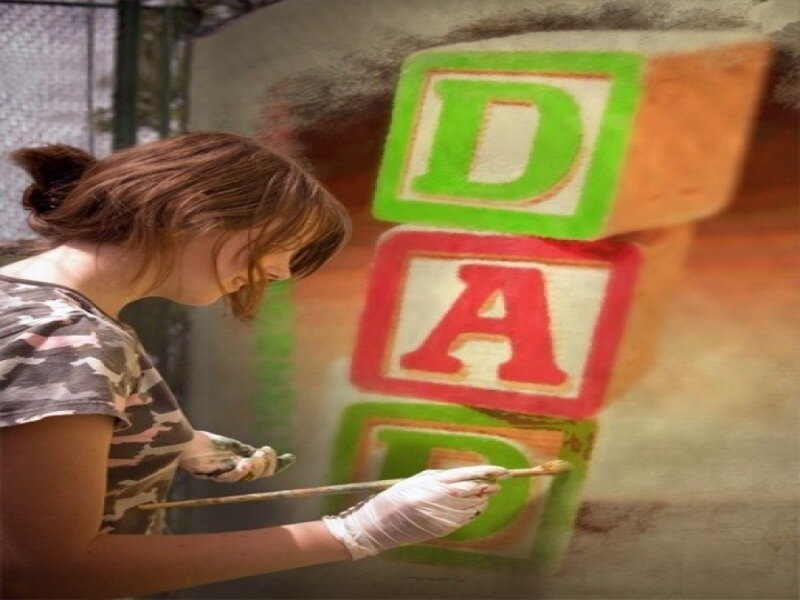 Woman Painting Blocks