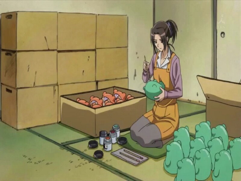 Woman Painting Figurines