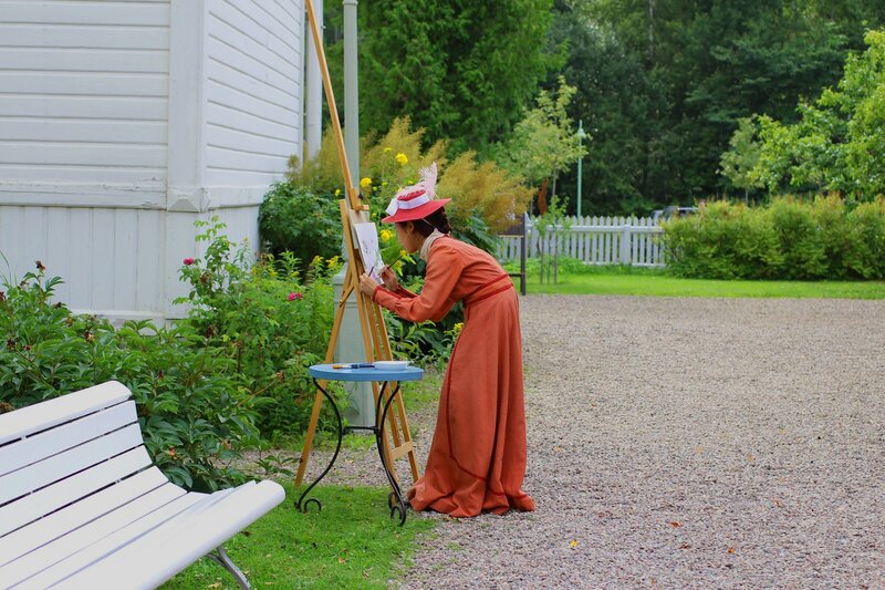 Woman Painting Outdoors — Orange