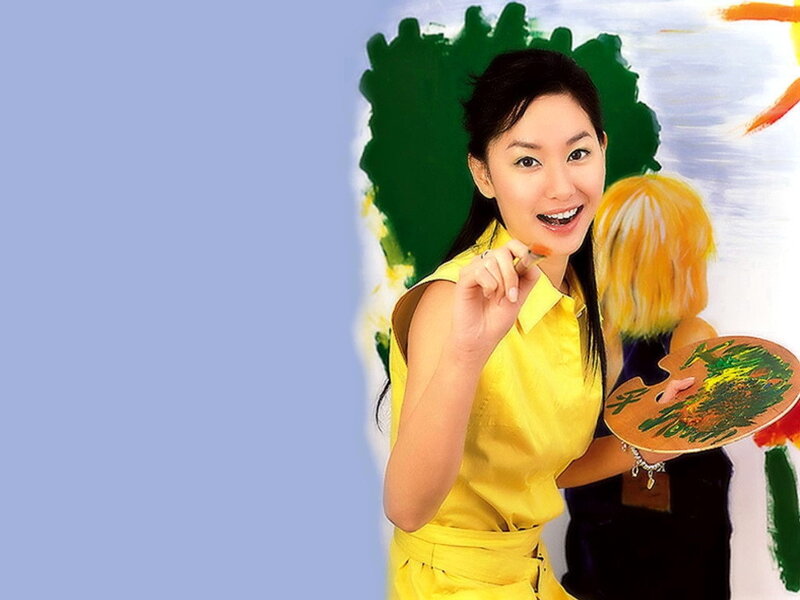 woman painting with palette