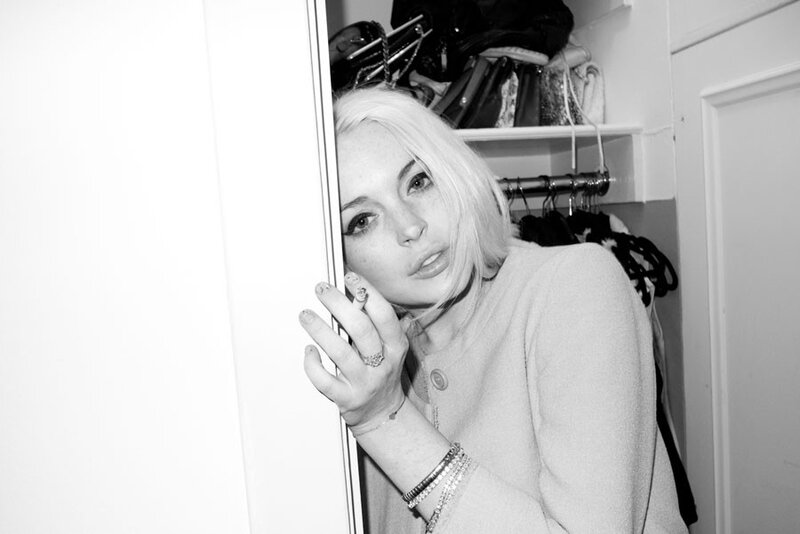 woman peeking from closet