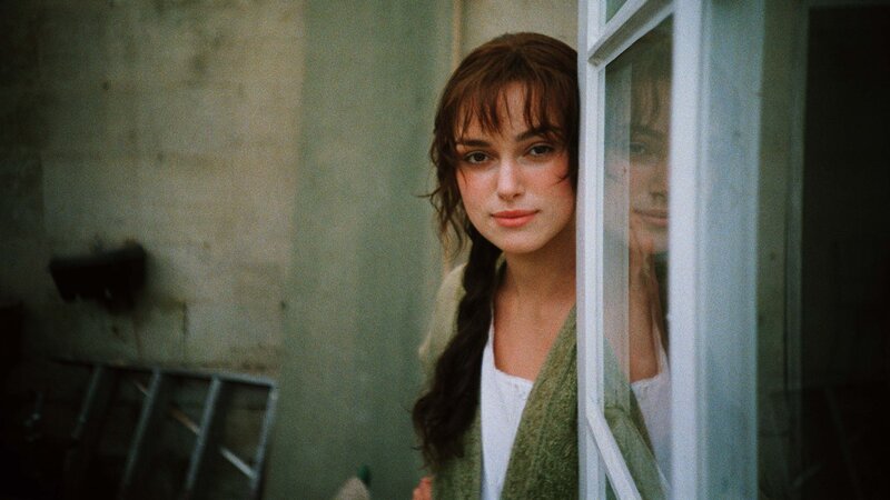 woman peeking from doorway