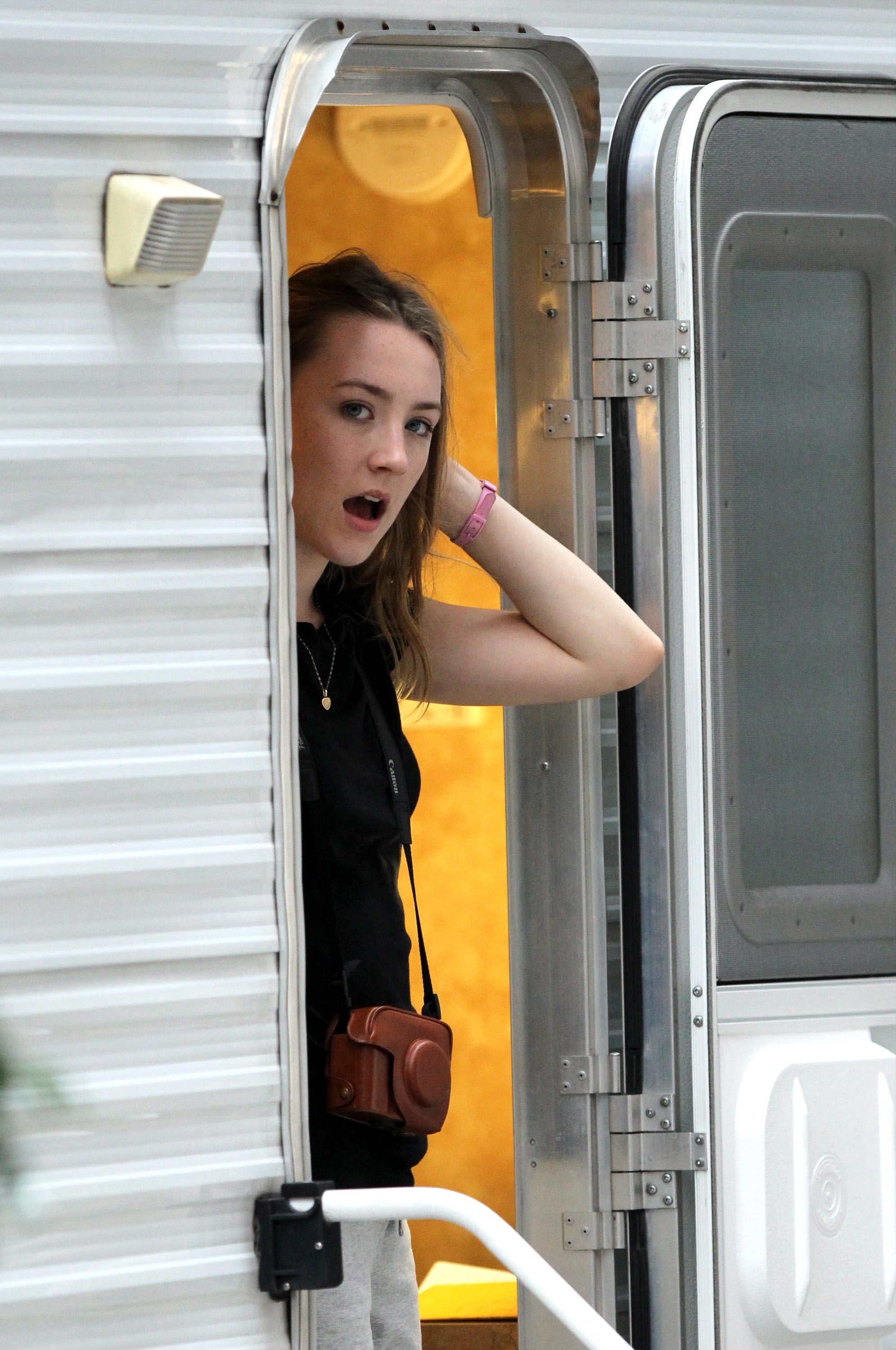 woman peeking from trailer