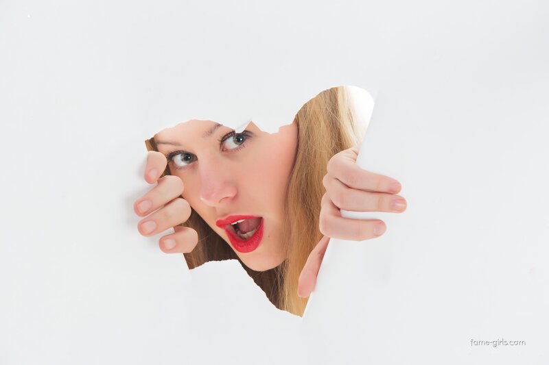Woman Peeking Through Hole
