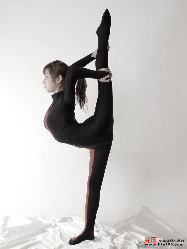 woman performing a split
