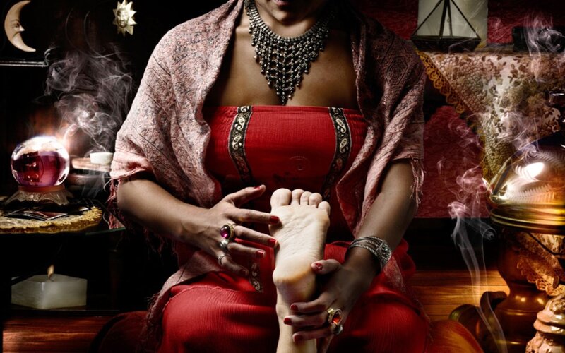 woman performing foot reading