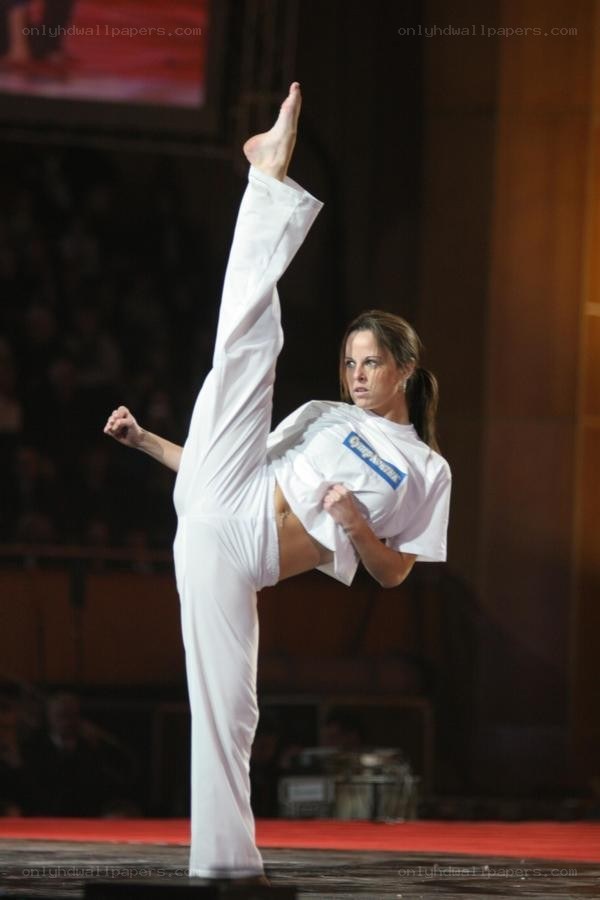 woman performing high kick