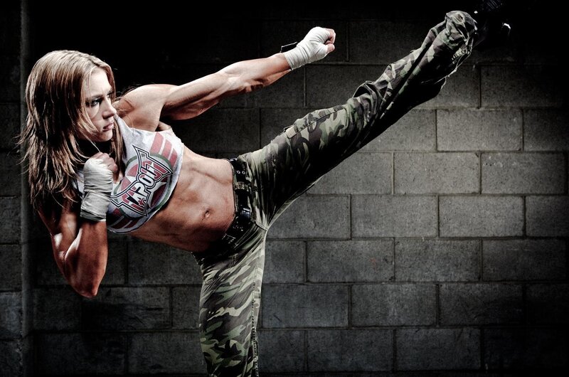 Woman Performing High Kick — Gray