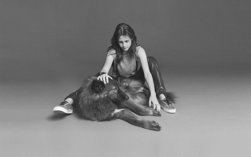 Woman Petting Wolf